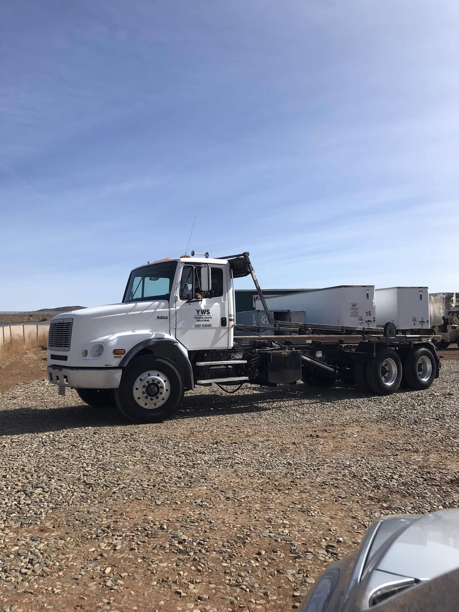 Roll-off truck for waste disposal services in Prescott by Yavapai Waste Solutions